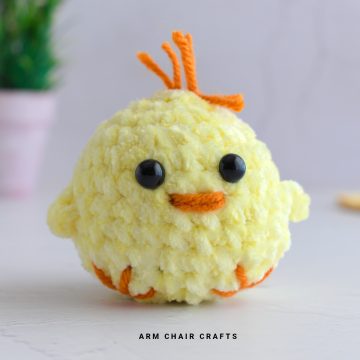 Close up image of a crochet chick.