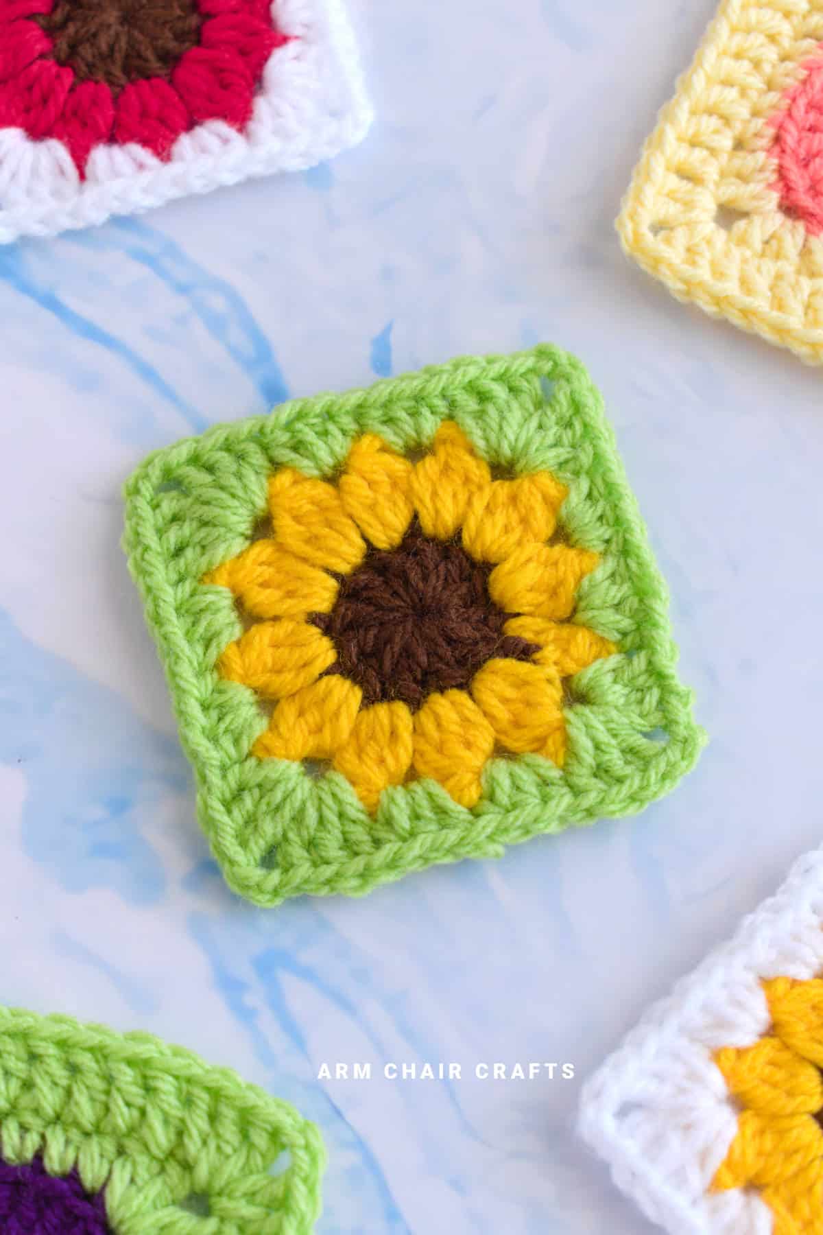 Close up image of sunflower granny squares.