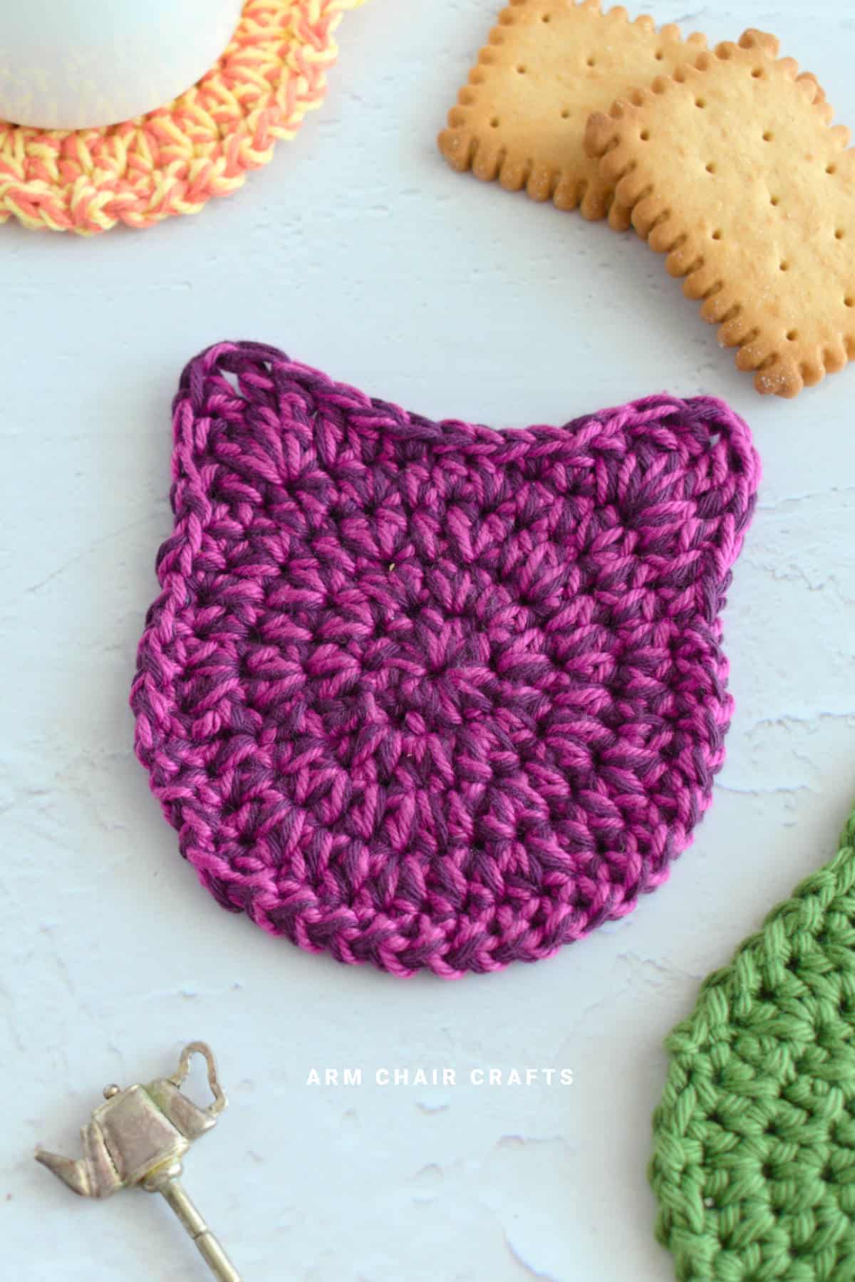 Crochet cat coasters.