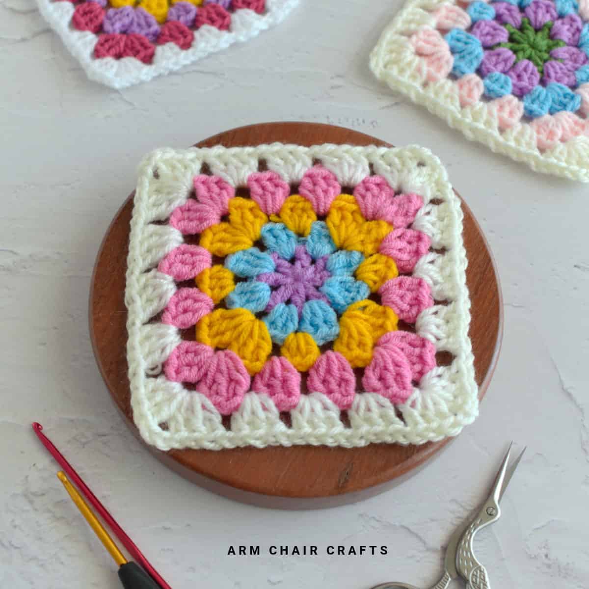 Close up image of a crochet granny square.