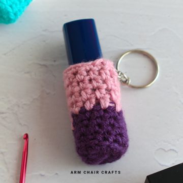 Close up image of a crochet lip balm holder.