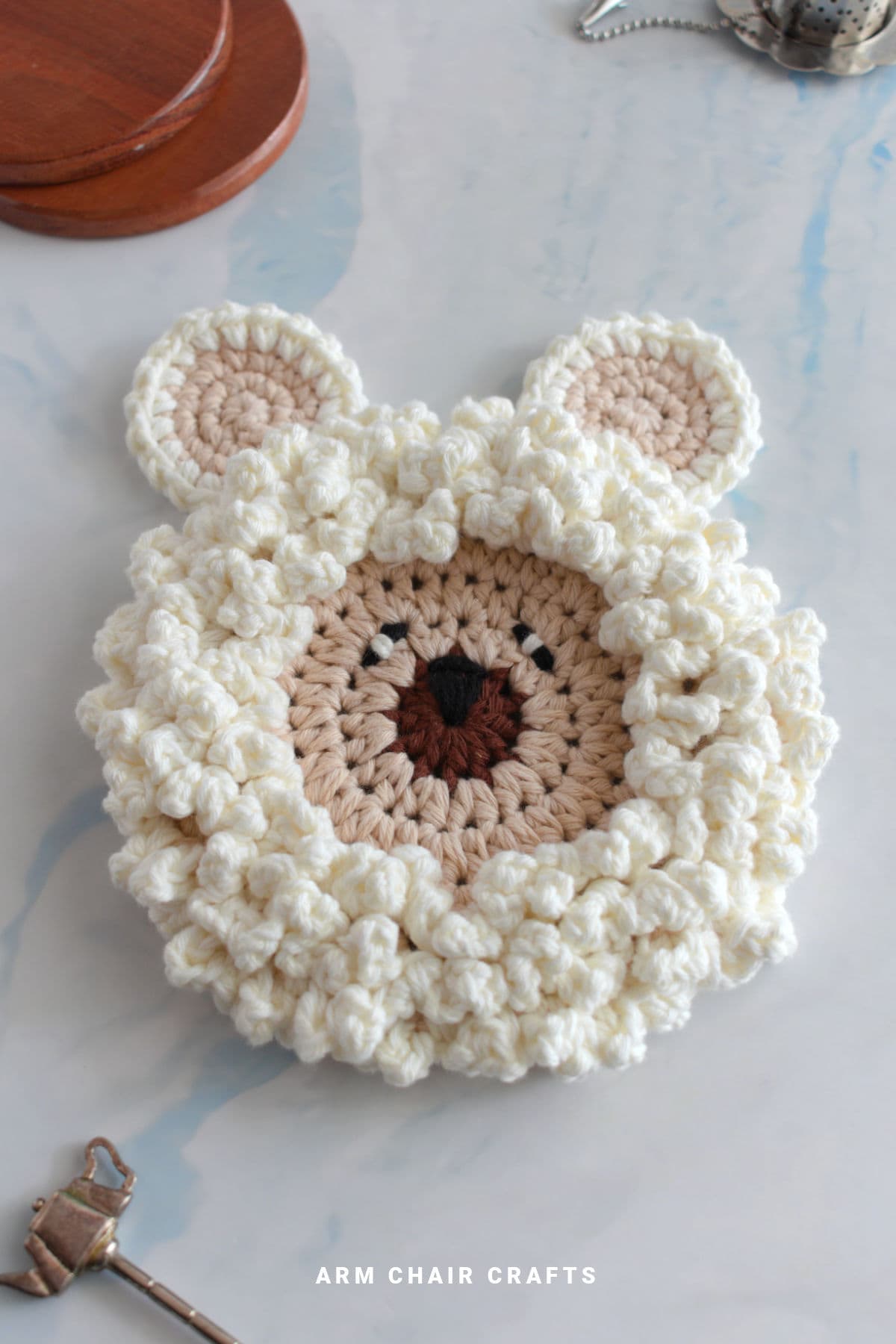 Sheep crochet coaster.
