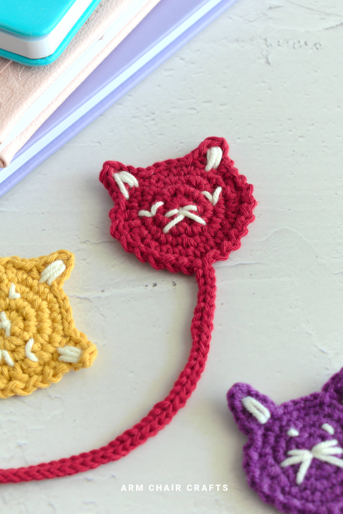 Red crochet cat bookmark.