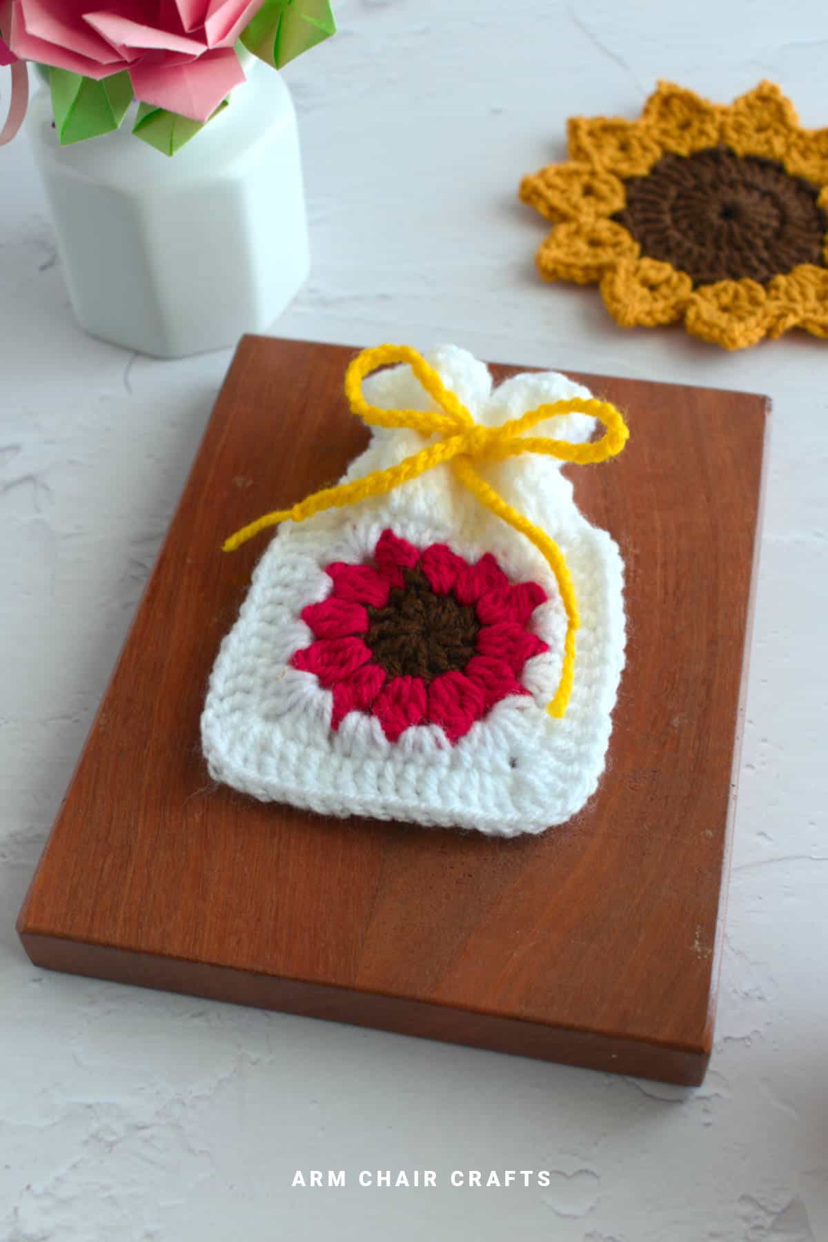 Red sunflower crochet pouch.