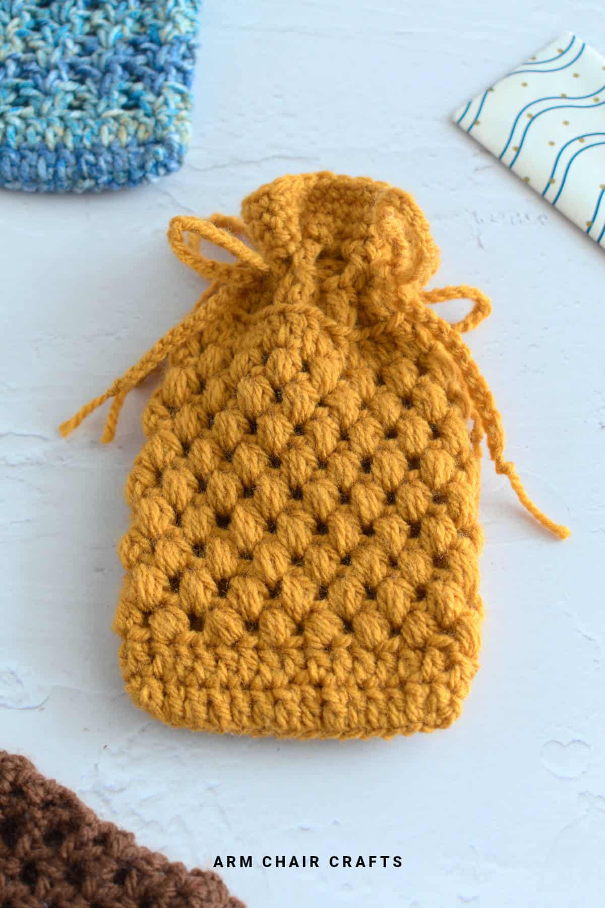 Close up image of a crochet pouch.