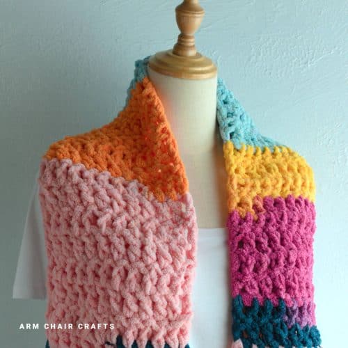 Close up image of a crochet scarf.