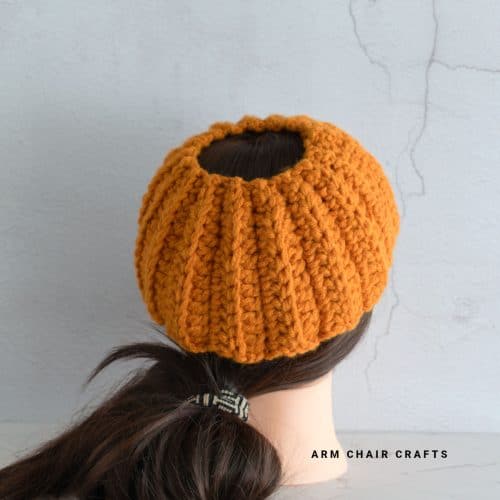 Bun crochet ear warmer.