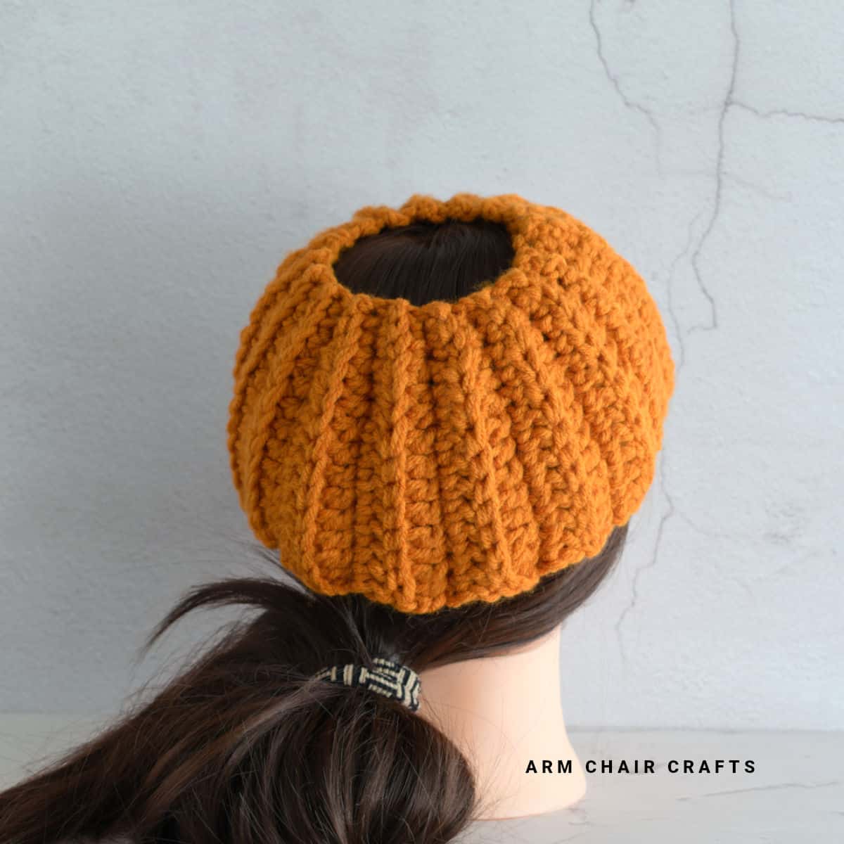Bun crochet ear warmer.