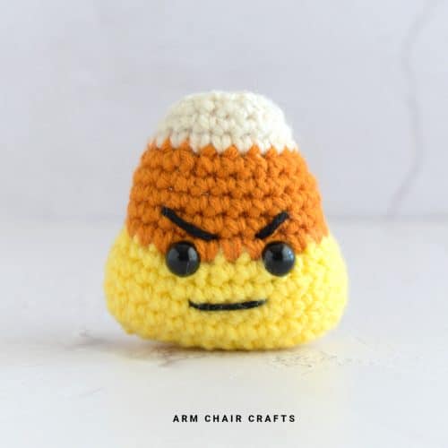 Close up image of a crochet candy corn.