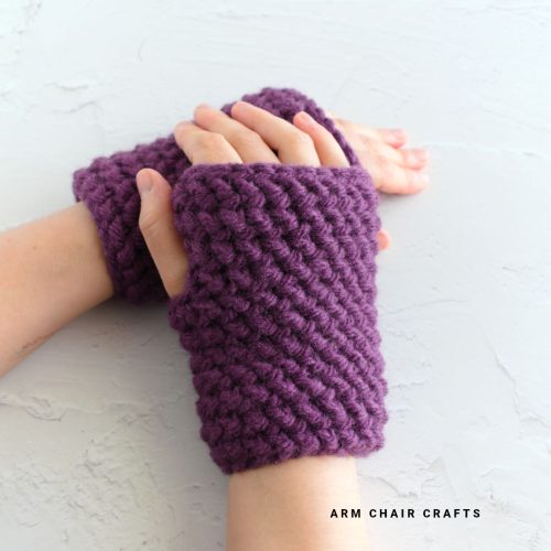 Close up image of herringbone crochet gloves.